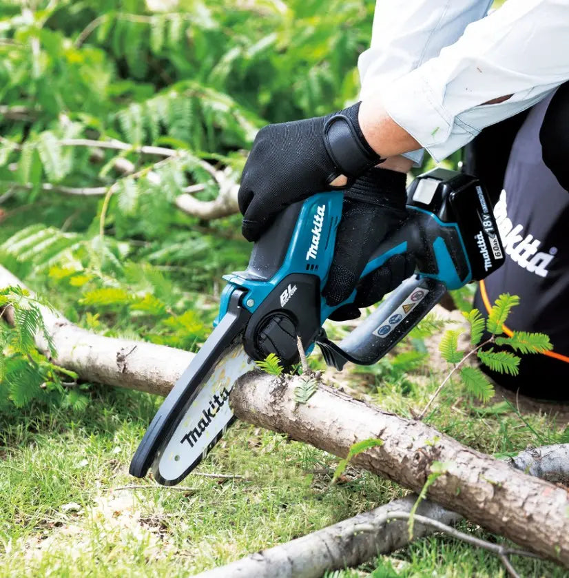 Makita - Motosega da potatura a batteria 18V 15 cm, 1 batteria Li-Ion da 5,0 Ah, caricabatterie